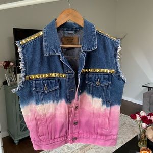 Distressed denim vest